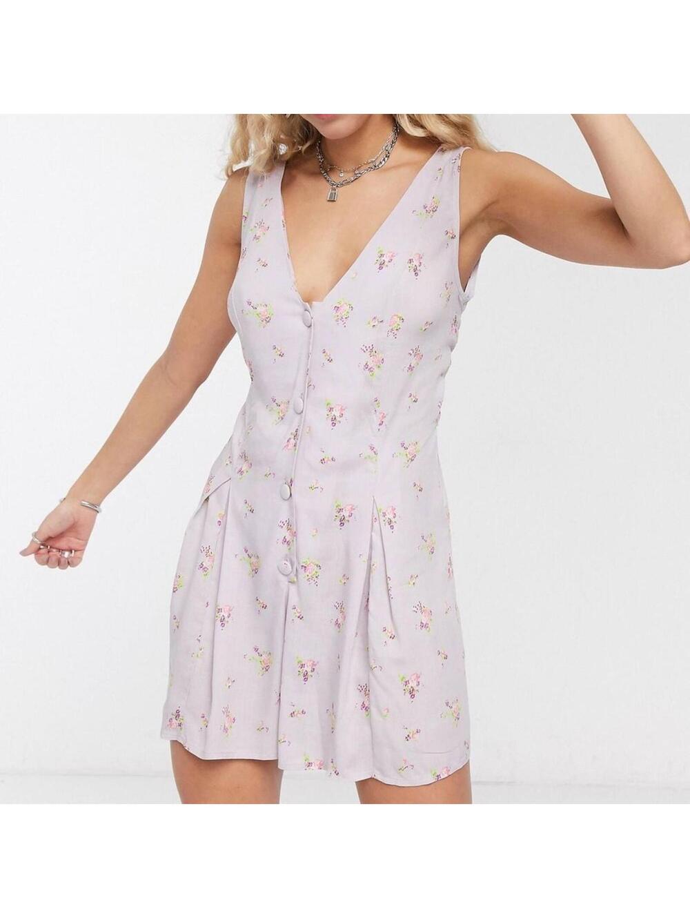 Reclaimed Vintage inspired swing playsuit with tie back detail in floral print